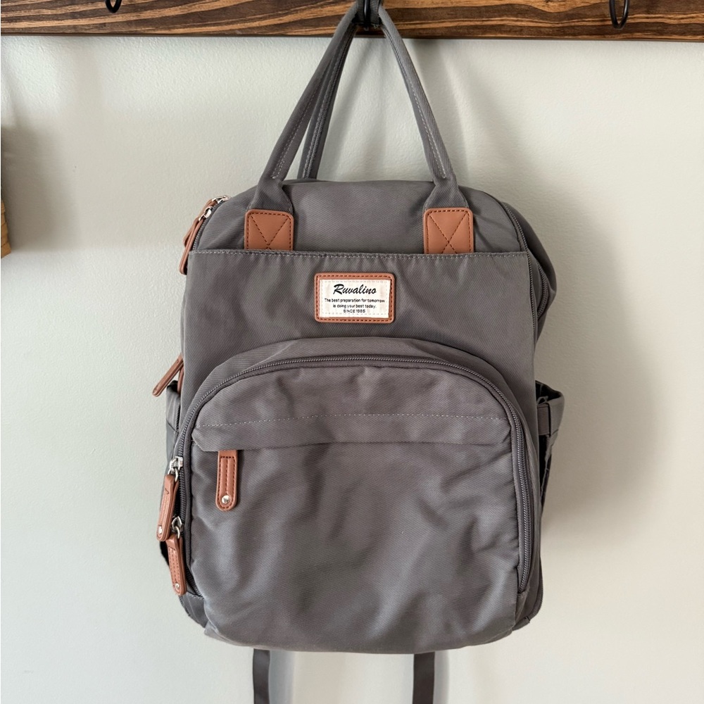 Gray Backpack Diaper Bag with Leather Accents and Modern Design